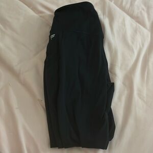 Three pairs of black small fabletics leggings